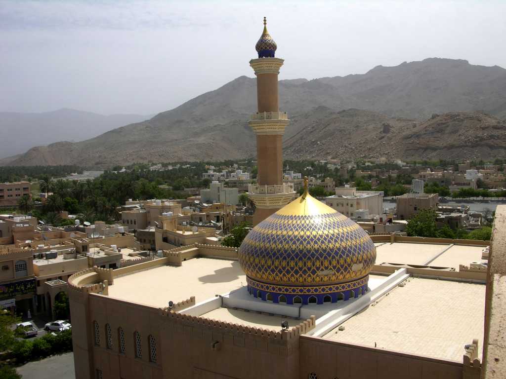 Muscat 06 Nizwa 10 Round Tower View Of Mosque In another direction the Round Tower offers a view of the town's chief landmark, an exquisite blue and gold domed Sultan Qaboos Mosque.